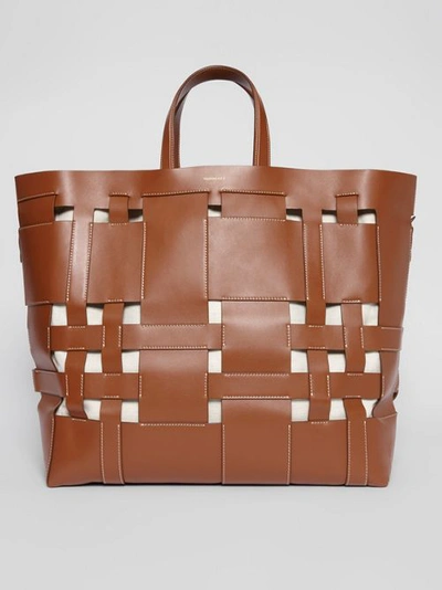 Shop Burberry Large Leather Foster Tote In Malt Brown