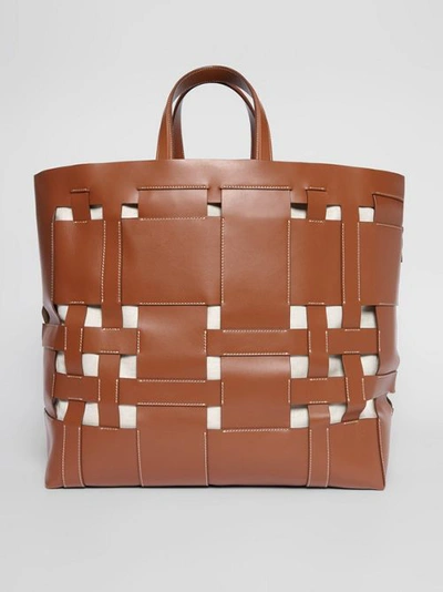 Shop Burberry Large Leather Foster Tote In Malt Brown