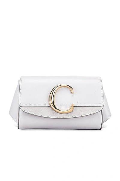 Shop Chloé Chloe C Belt Bag In White In Light Cloud