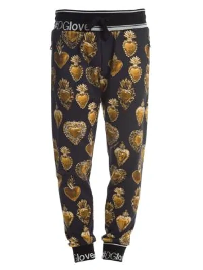 Shop Dolce & Gabbana Sacred Heart Sweatpants In Black Gold