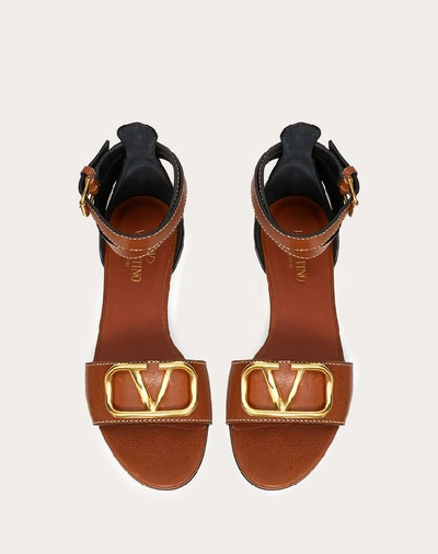 Shop Valentino Garavani Vlogo Cowhide Sandal In Tan