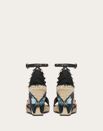 Shop Valentino Garavani Embroidered Butterfly Canvas Wedge Sandal 105 Mm In Black
