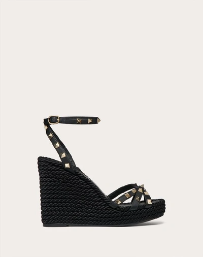 Shop Valentino Garavani Rockstud Calfskin Ankle Strap Wedge Sandal 95 Mm In Black