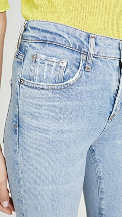 Shop Agolde Toni Mid Rise Skinny Jeans In Daylight