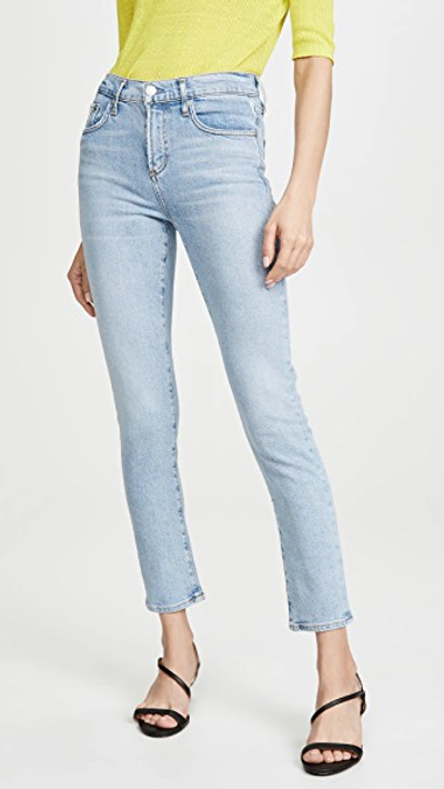 Shop Agolde Toni Mid Rise Skinny Jeans In Daylight