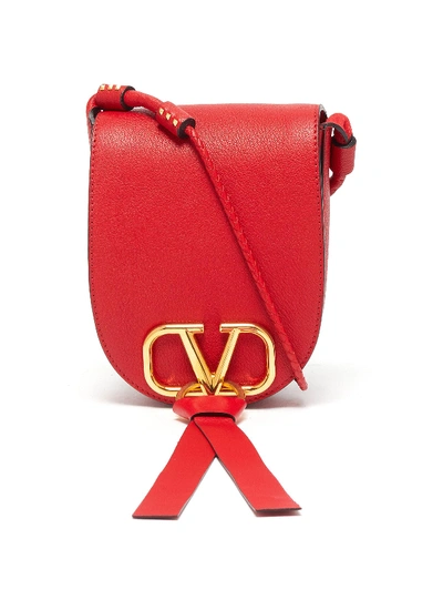 Shop Valentino Garavani 'vring' Tassel Small Leather Saddle Bag In Red