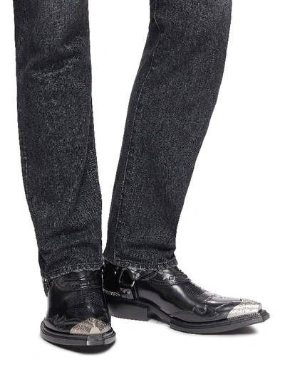 Shop Balenciaga 'jive' Logo Embossed Metallic Toe Cap Leather Booties In Black