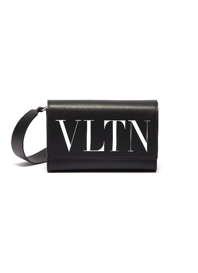 Shop Valentino Garavani 'vltn' Logo Print Leather Convertible Belt Bag