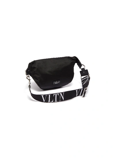 Shop Valentino 'vltn' Logo Strap Bum Bag In Black