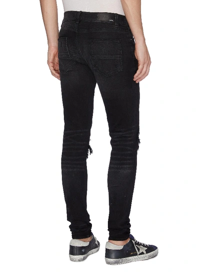 Shop Amiri 'mx1' Bandana Patch Ripped Skinny Jeans In Black