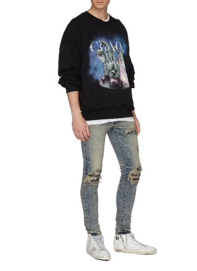 Shop Amiri 'mx1' Bandana Patch Ripped Skinny Jeans In Indigo