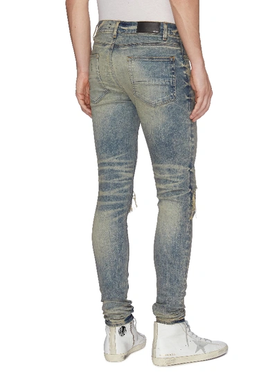 Shop Amiri 'mx1' Bandana Patch Ripped Skinny Jeans In Indigo