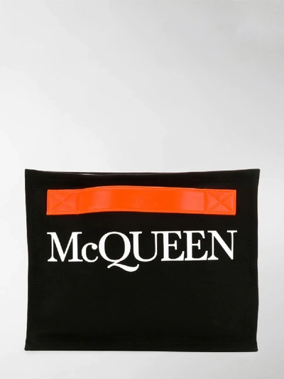 Shop Alexander Mcqueen Logo Print Clutch Bag In Black