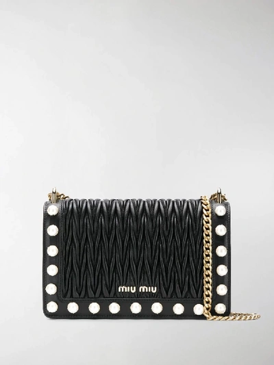 Shop Miu Miu Matelassé Pearl Detail Shoulder Bag In Black