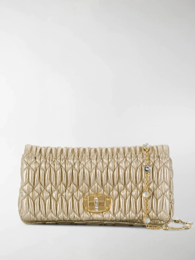 Shop Miu Miu Gemstone Embellished Shoulder Bag In Gold
