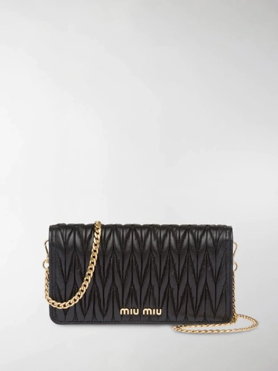 Shop Miu Miu Matelassé Leather Mini Bag In Black