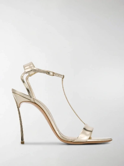 Shop Casadei T-bar Sandals In Gold