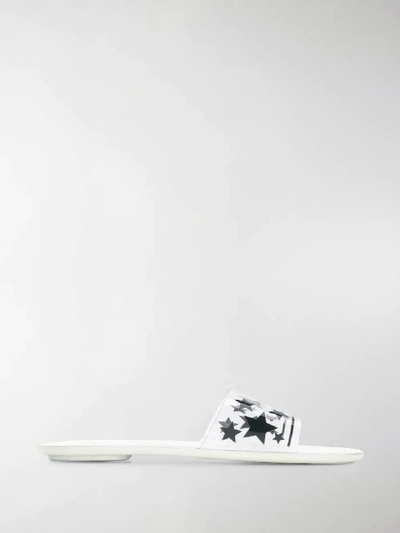 Shop Miu Miu Star Print Slides In White