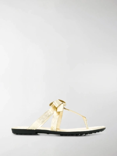 Shop Tod's Toe Post Sandals In Gold