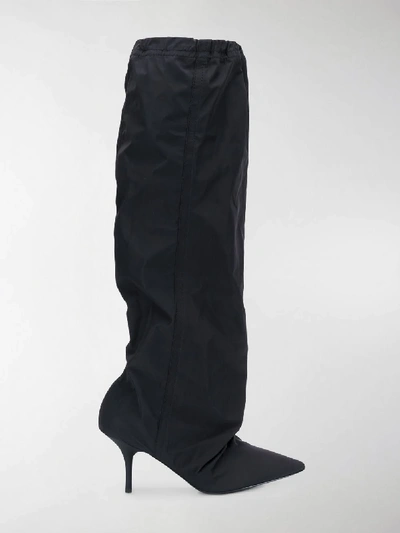 Shop Yeezy Slouchy Knee Length Boots In Black