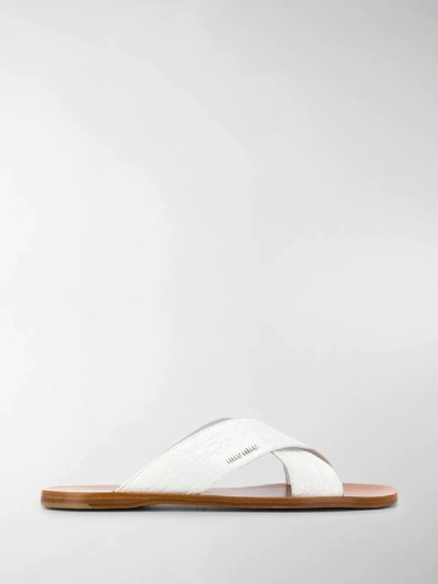 Shop Miu Miu Crisscross Sandals In White
