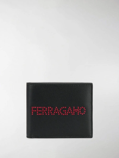 Shop Ferragamo Logo Studded Bi-fold Wallet In Black