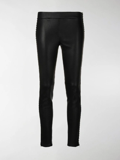 Shop Alexander Mcqueen Studded Skinny Trousers In Black