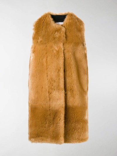 Shop Msgm Faux Fur Long Gilet In Brown