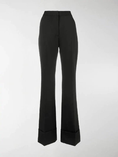 Shop Stella Mccartney Flared Trousers In Black