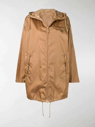 Shop Prada Logo Raincoat In Brown