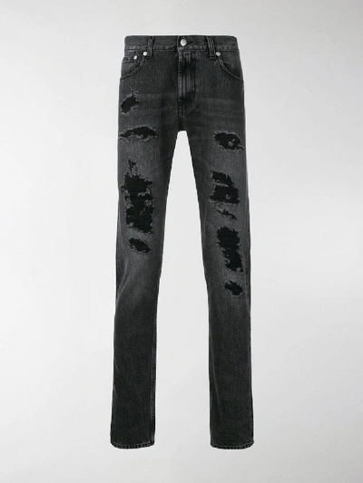 Shop Alexander Mcqueen Distressed Straight Cut Jeans In Black