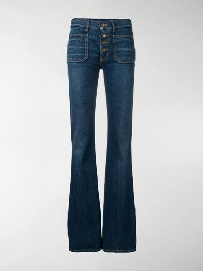 Shop Saint Laurent Flared Jeans In Blue