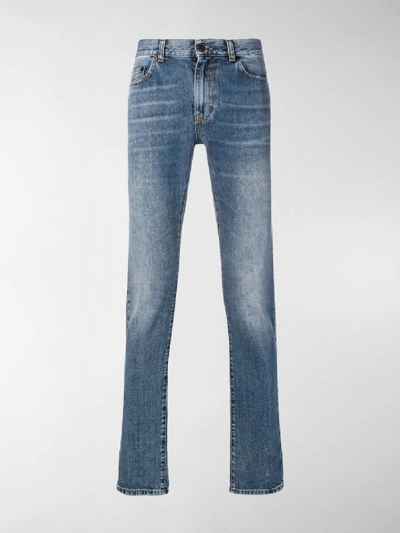 Shop Saint Laurent Tapered Jeans In Blue