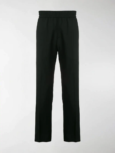 Shop Givenchy Vertical Logo Jogger Pants In Black