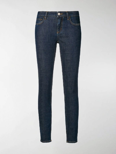 Shop Dolce & Gabbana Rear-slogan Skinny-fit Jeans In Blue