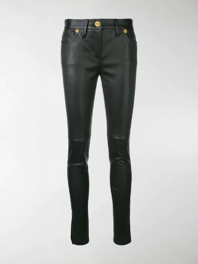 Shop Versace Skinny Trousers In Black