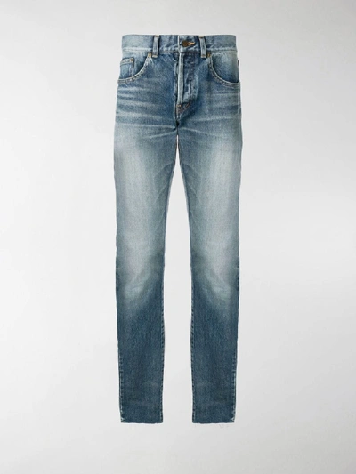 Shop Saint Laurent Bandana Raw-edge Jeans In Blue