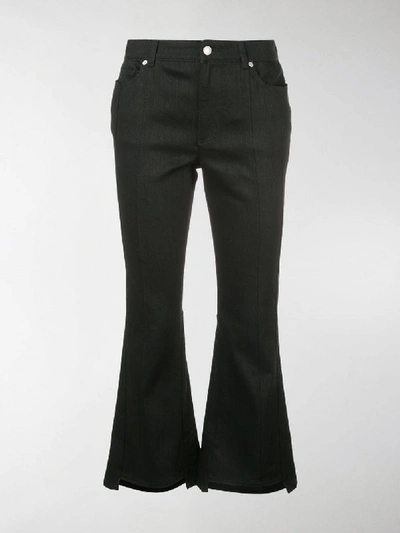 Shop Alexander Mcqueen Kick-flare Cropped Jeans In Black