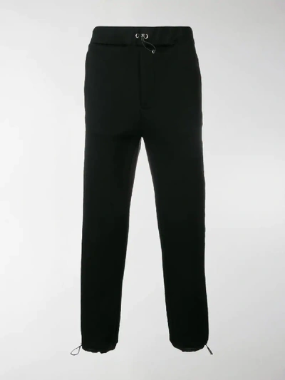 Shop Prada Technical Trousers In Black