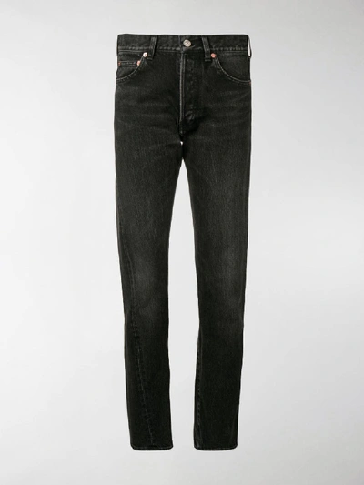 Shop Balenciaga Faded Denim Jeans In Black