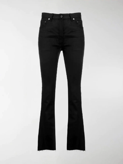 Shop Saint Laurent Frayed Flared Jeans In Black