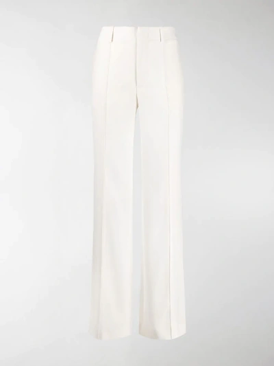 Shop Chloé Pleated Front Flared Trousers In White
