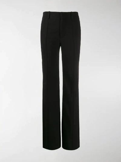 Shop Chloé Pleated Front Flared Trousers In Black