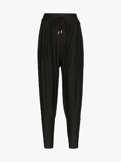 Shop Charli Cohen Saber Matte Tapered Trousers In Black