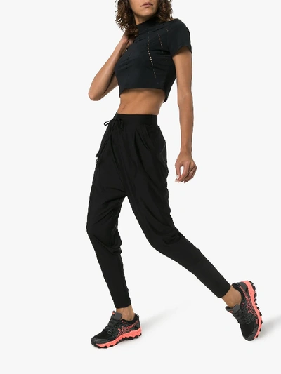 Shop Charli Cohen Saber Matte Tapered Trousers In Black