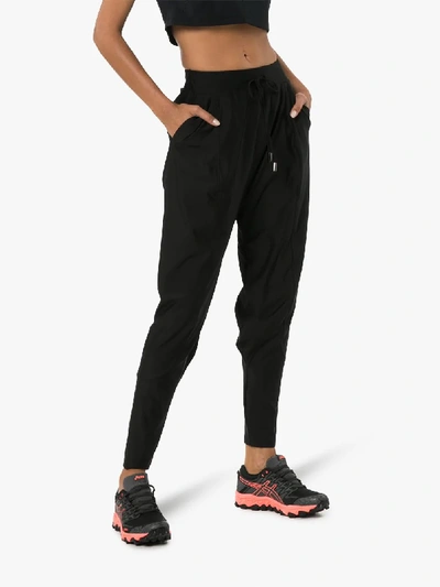 Shop Charli Cohen Saber Matte Tapered Trousers In Black