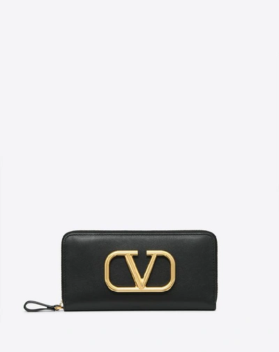 Shop Valentino Garavani Vlogo Calfskin Zippered Wallet In Black