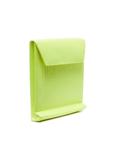 Shop Balenciaga 'shopping' Logo Print Neon Leather Envelope Clutch In Acid Green
