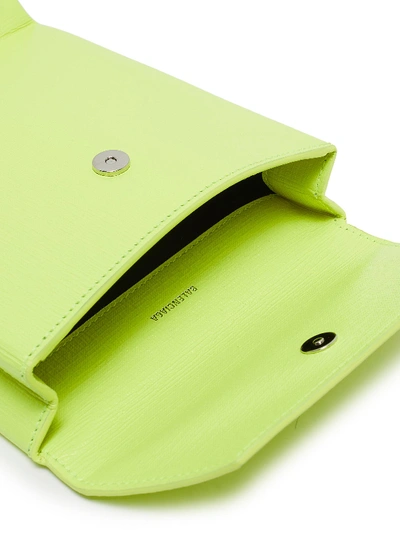 Shop Balenciaga 'shopping' Logo Print Neon Leather Envelope Clutch In Acid Green