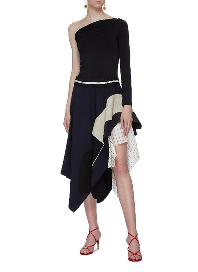 Shop Monse Pinstripe Panel Tiered Asymmetric Patchwork Wool Skirt